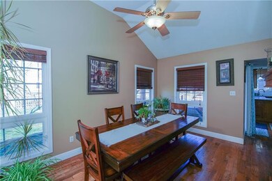 formal dining area w/see thru fireplace from livin