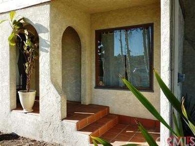 Extensive use of Saltillo tile from walkway to por