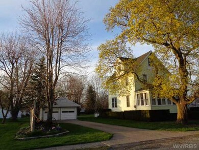 Exterior Front Side view of house and garage/ with