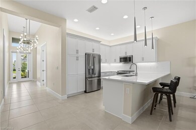 Light and bright kitchen and foyer