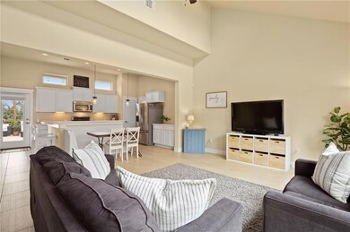 Living area featuring a towering ceiling