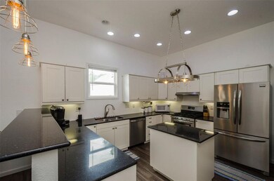 Custom Kitchen with Quartz countertops, custom whi