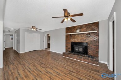 Laminate flooring, fireplace, two ceiling fans