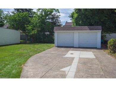 The garage has separate garage door openers and ample storage.