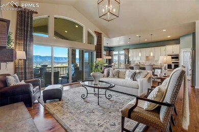 The family room flows into the kitchen and both le