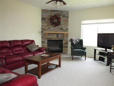 This is one of 2 gas fireplaces. The kitchen is of