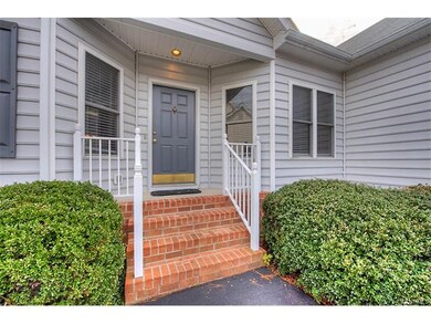 Vinyl siding, aluminum railings, brick steps...mai