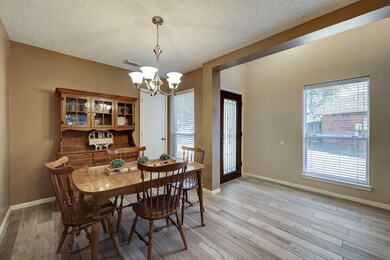 The dining area is an elegant touch as you enter the home.  There is also a closet at the front of the home.  This home has ample storage throughout.  The home has a spacious breakfast room so the formal dining space could also be used as office space or a seating area.