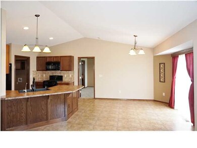 View of Kitchen & Dining from Living Room.