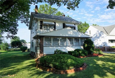 View of front of property featuring a front yard