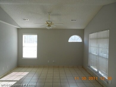 Living Room. Open and bright with cathedral ceilings.