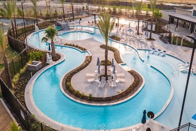 Amenities include a community center, planned park