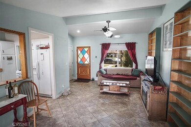 Living room is open to the kitchen.
