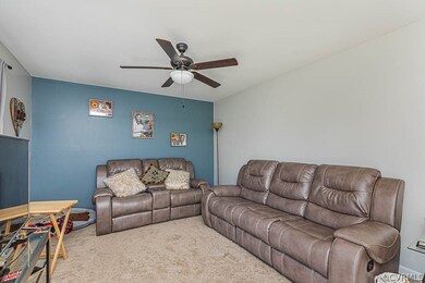 FAMILY ROOM W/ CEILING FAN, LARGE WINDOW