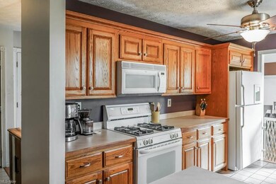 The kitchen has a breakfast bar and lots of counte
