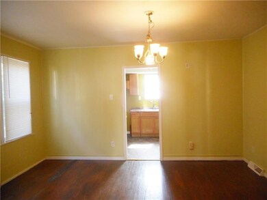 Dining room with hardwood flooring