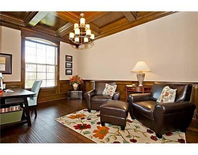 Living Room. Living area/dining with gorgeous wood floors.  Open concet with beautiful woodwork ceilings.