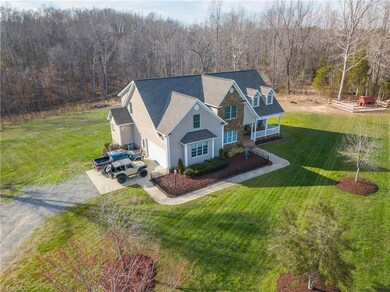 Lovely home, great curb appeal with 2-car garage, rocking chair porch, and so much more!
