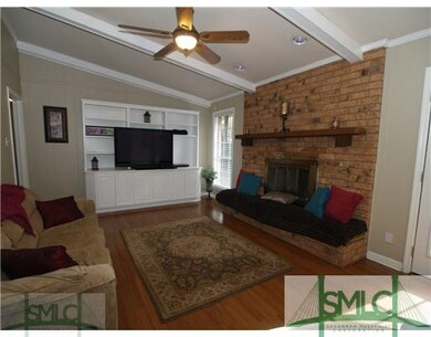 Living Room. Wood floors warm up this space and ha