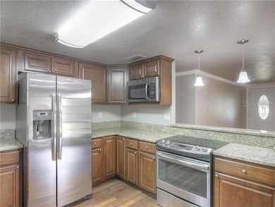 updated kitchen with Granite and steel appliances