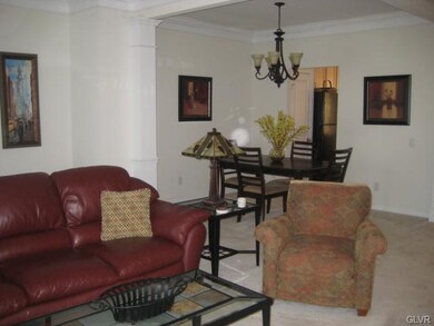 The dining area is set off by stylish crown moldin
