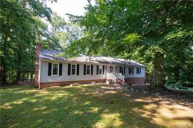 View of front of property featuring a front lawn