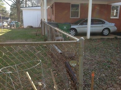 Fenced yard for one unit and wired storage buildin