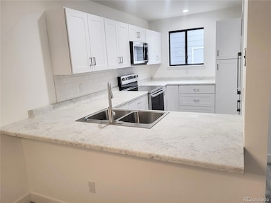 1475 S Quebec Way unit J48, Denver, CO 80231 - photo 6