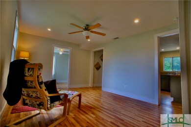 Modernized layout flows from living room to kitche