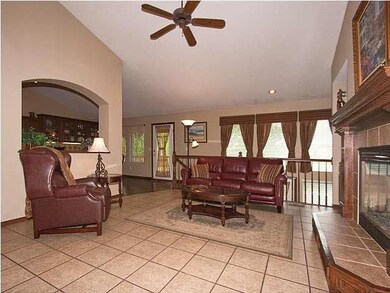 Lovely tiled living room with vaulted ceilings, ga