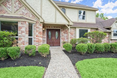 Curb appeal with mature trees.