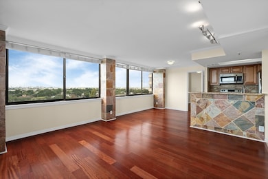 The dining area sits conveniently off the kitchen, offering an ideal space for meals or entertaining. With its open layout and natural light, it’s the perfect spot to gather and enjoy the view from your 9th-floor retreat.