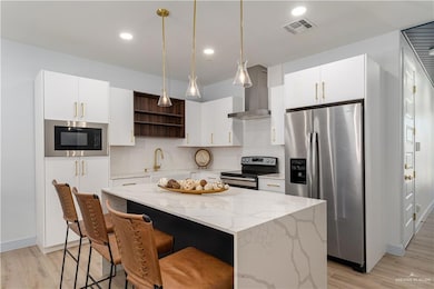 Kitchen with Waterfall Island