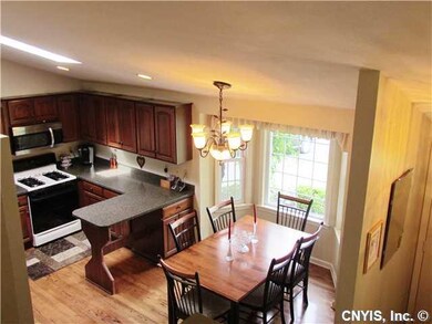 Kitchen Dining. Vaulted ceilings and a great bay w