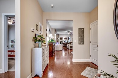 Hallway featuring hardwood flooring
