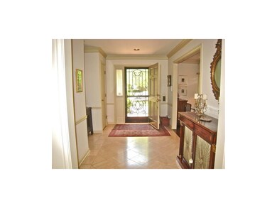 Marble flooring in entry foyer