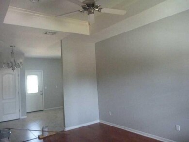 Living Room. Showing Trey ceiling and Breakfast ar