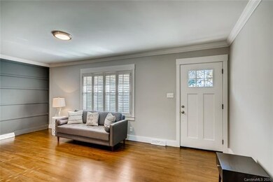 Enter into the living room with designer accent wa