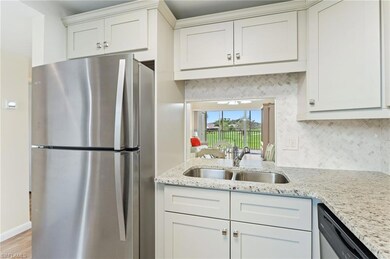 Kitchen featuring stainless steel appliances, ligh