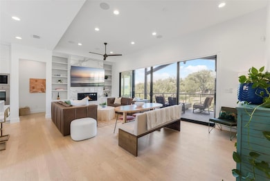 Living area with a premium fireplace, built in fe