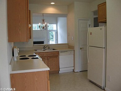 Kitchen - Kitchen with opening to formal dining ar