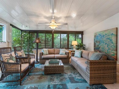 Lovely Florida Garden Room With Travertine Floors.  Separate A/C On Remote.  New Impact Window & Impact Door (Left of Photo) Opens To Screened Patio.