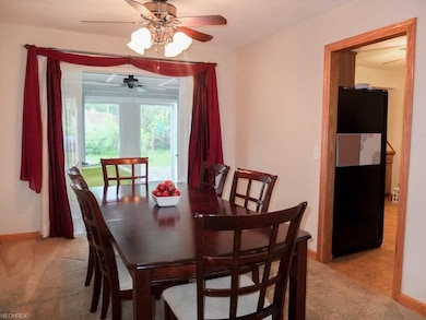 Formal dining room with French doors to the sun ro