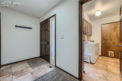 Front entrance - laundry room and entrance from ga