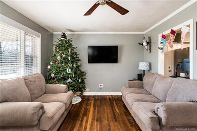 open living room looking into kitchen area