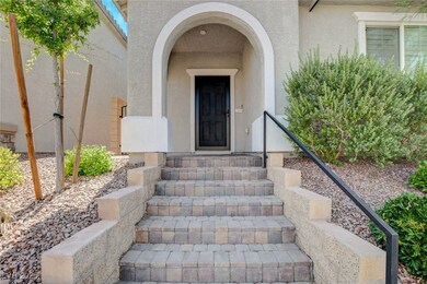 Property entrance with stucco siding
