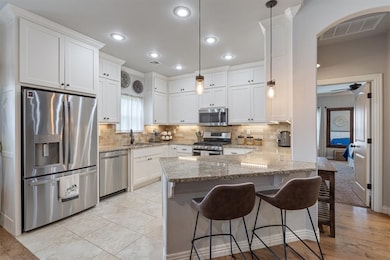 Kitchen w/ granite counter tops