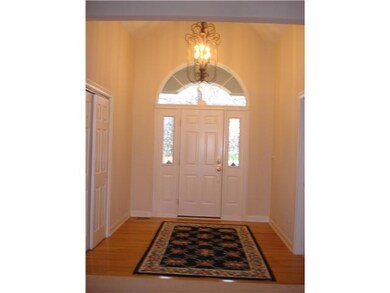 Entry. ENTRY FOYER HAS HARDWOOD FLOORING AND VAULTED CEILING. DEN/OFFICE/4TH BEDROOM IS OFF TO ONE SIDE AND GUEST CLOSET ON THE OTHER SIDE