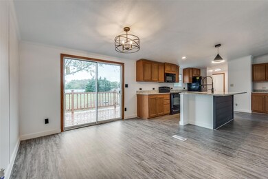 Kitchen featuring hardwood / wood-style flooring, 