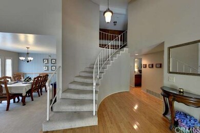 Entry with sweeping straircase